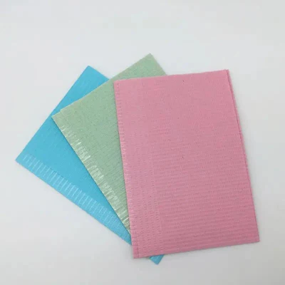 Consumibles médicos sin ataduras Almohadillas de papel Baberos de papel dentales